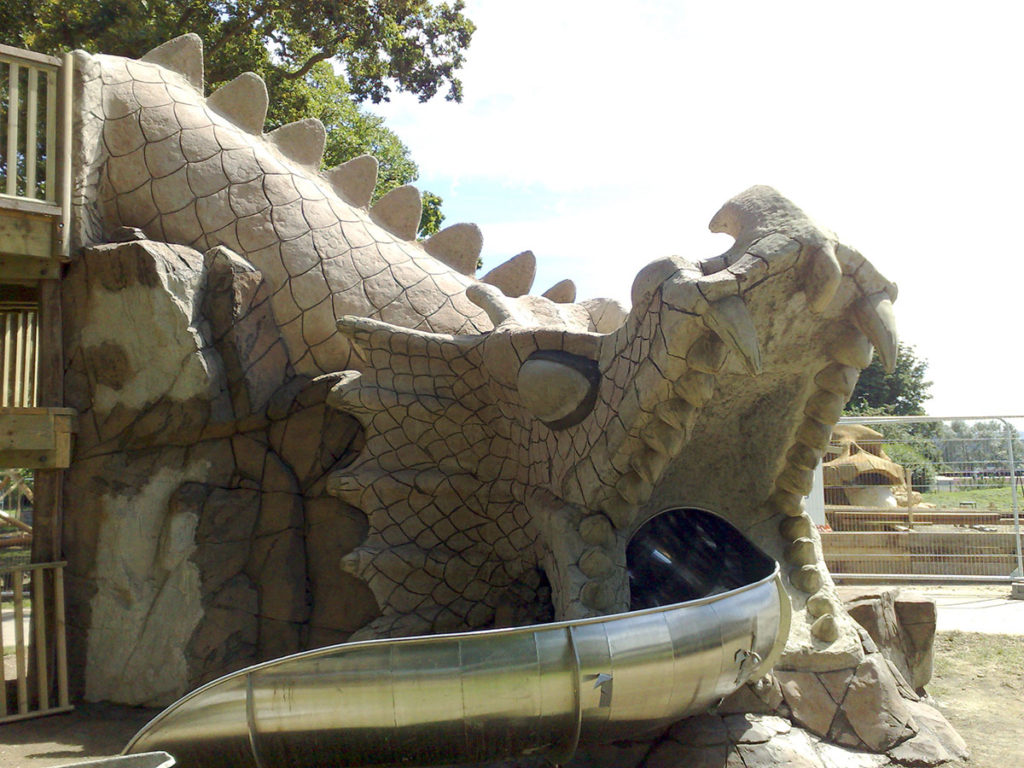 Concrete theme park set of open mouthed dragon